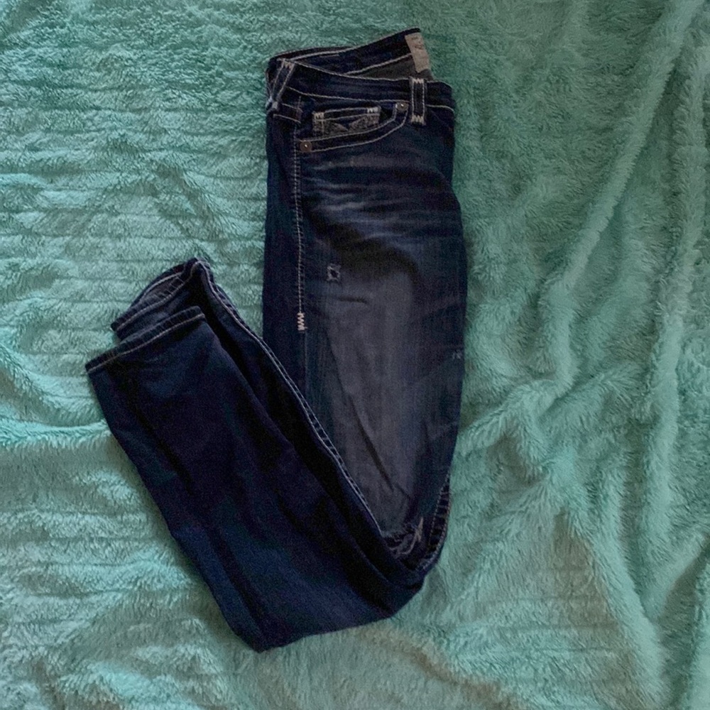 Big star skinny jeans with a hole in the knee